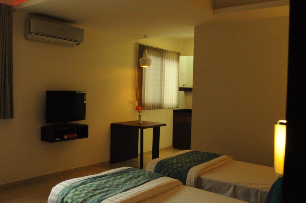 Ixora Suites Bangalore Room photo